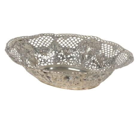 A LATE 19TH CENTURY GERMAN SILVER OVAL BASKET pierced and embossed with a family in a garden to the centre, scale pattern and