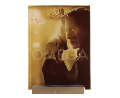 AN OMEGA PERSPEX DISPLAY SIGN advertising James Bond Casino Royale, 28cm x 20cm