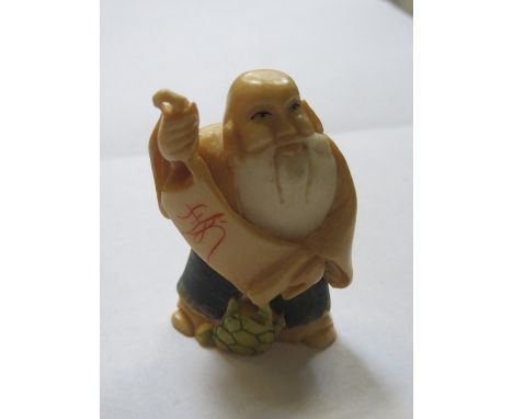 HEAVILY CARVED ORIENTAL IVORY NETSUKE OF A ELDERLY GENT WITH SCROLL, SIGNED TO BASE