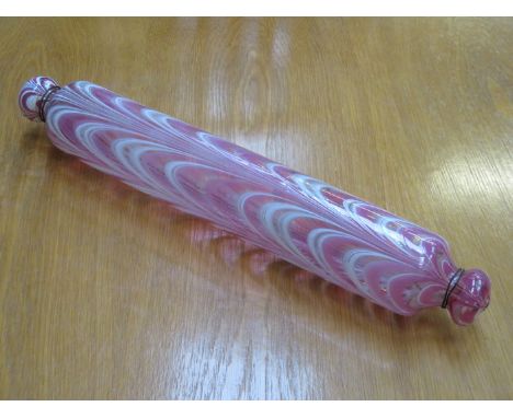 DECORATIVE NAILSEA HOLLOW CRANBERRY GLASS ROLLING PIN, LENGTH APPROXIMATELY 42cm 