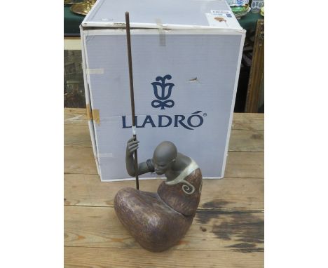 BOXED LLADRO GLAZED AND UNGLAZED CERAMIC FIGURE - AFRICAN MAN (AT FAULT)