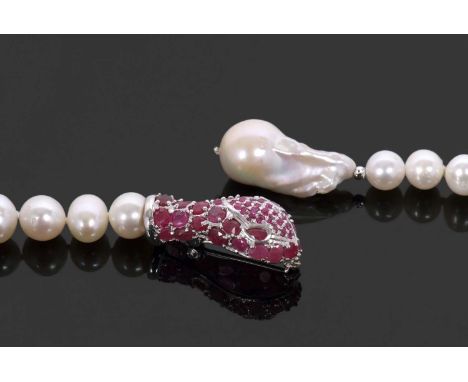 A cultured pearl and ruby snake head lanyard style necklace, the strand cultured pearls, with 30mm long baroque cultured pear