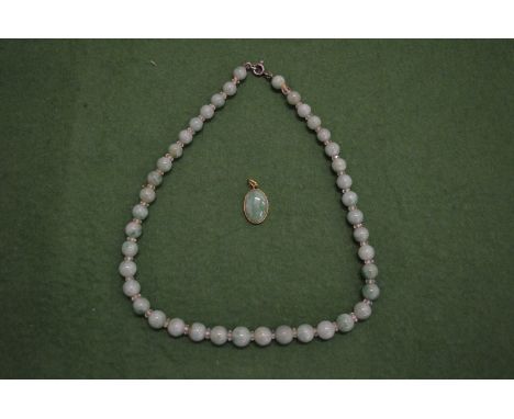 A jade bead necklace.