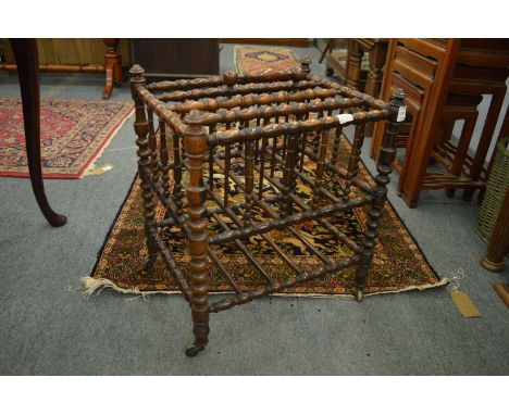 A Victorian rosewood bobbin turned magazine rack.