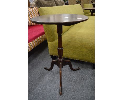 A 19th century mahogany circular tilt-top tripod table.