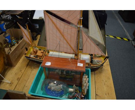 Large model ship and other similar smaller ships.