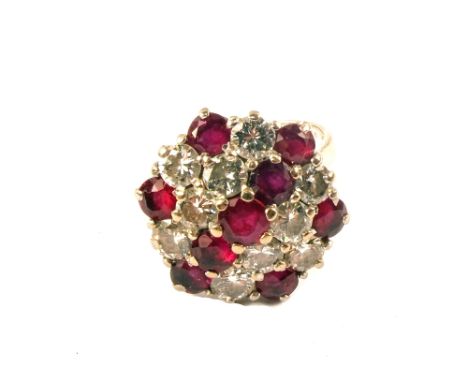 An 18ct white gold, ruby and diamond cluster ring, estimated total diamond weight 2cts, estimated total ruby weight 3.25cts, 