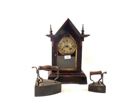 A mantel clock plus two box irons