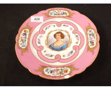 A 19th Century Sevres plate painted with a portrait of Mme de Montbazon and crest to rear (rim chip)