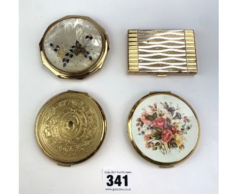 3 round Strattan compacts and 1 Agme Switzerland compact