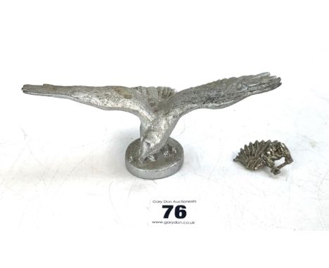 Vintage  car mascot metal figure of an eagle 7" wide and metal Native American badge 1.75"