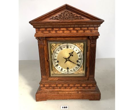 W &amp; H, Germany carved wooden bracket clock with 3-hole brass face, 16.5" h x 12"w x 8" d