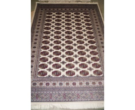 Beige ground bokhara carpet 2.30 x 1.60