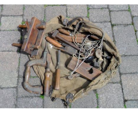 Old cloth tool bag with joiner's tools