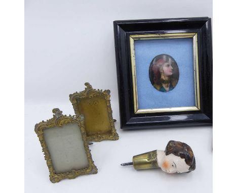 Continental school, late 19th century head &amp; shoulders portrait of a gypsy girl, oil on porcelain, miniature, 4.3x3cm, an