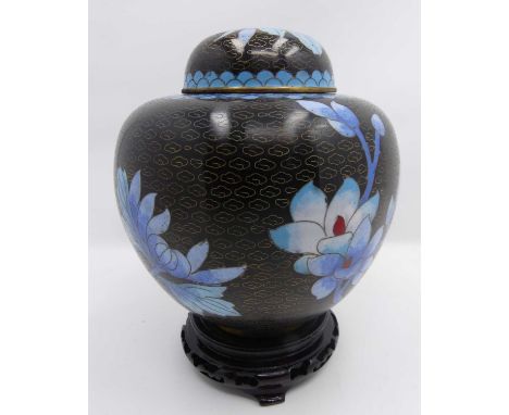 A Chinese cloisonne enamel decorated ginger jar, h.14cm, upon a carved hardwood stand