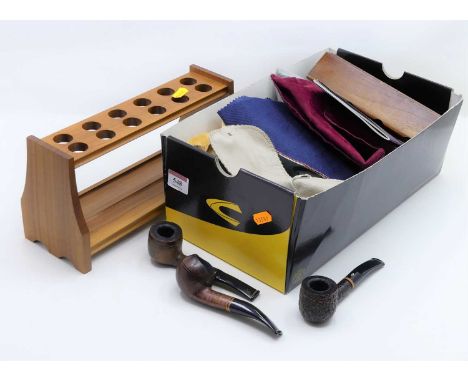 A collection of vintage smoking pipes, to include an example by Millville; together with a wooden pipe stand27 pipes in total
