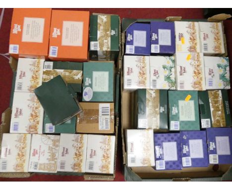 A collection of Lilliput Lane cottages, to include Winter Warmer, Sore Paws and Tea Caddy Cottage (2 boxes)Appear in good con