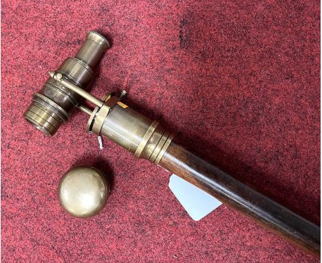 A reproduction walking stick, having a telescope handle, length 96cm