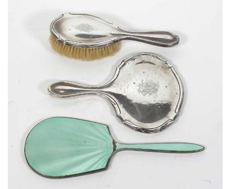 A George VI silver clad and guilloche enamel dressing hand mirror, Birmingham 1936, L.29.5cm, together with a Victorian silve