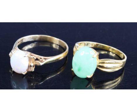 A modern 14ct gold and cabochon opal set dress ring, size N, together with a modern 8ct gold and cabochon jade set dress ring