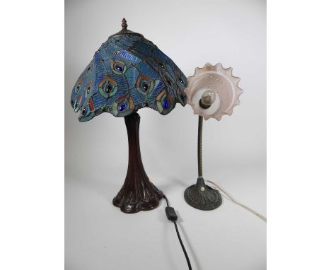 A Tiffany style twin light table lamp, having stained glass shade over a bronzed resin base, height 57cm, together with a mid