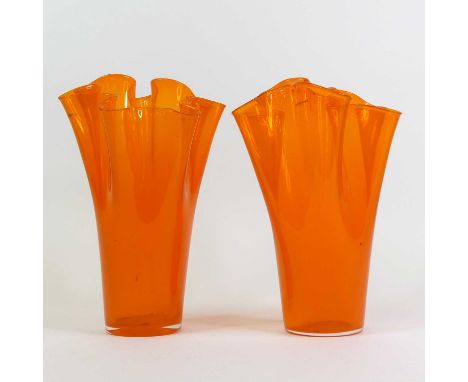 A collection of coloured glassware and ceramics, to include a large pair of Polish orange handkerchief vases, h.31cm, oversiz