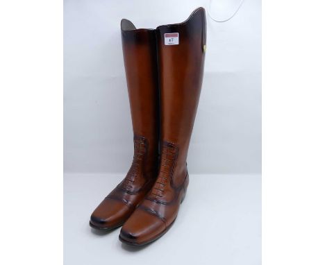 A novelty composite stick stand modelled as a pair of riding boots height 48cm