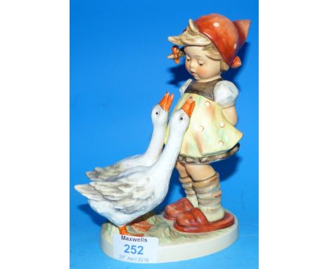 An M J Hummel large figurine:  Goose Girl, limited edition, 1 of 200, with plinth, certificate, and original box