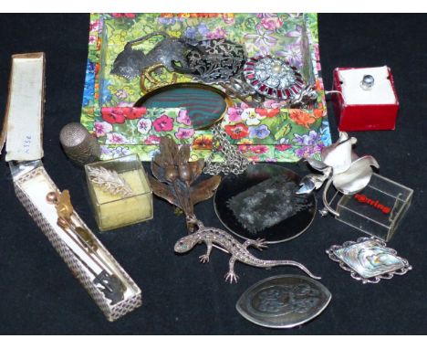 Three stick pins; a selection of costume jewellery; evening purses; a leather bound bible