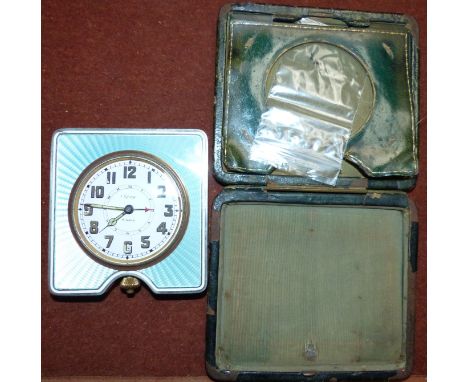 A silver and enamel cased easel clock, maker Finnegan's, London 1929, with associated Asprey alarm movement