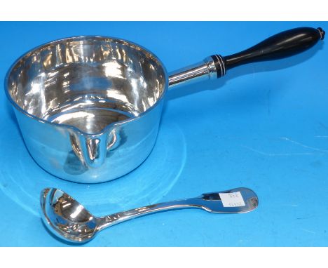 A French white metal saucepan with turned ebonised handle, and a matching ladle