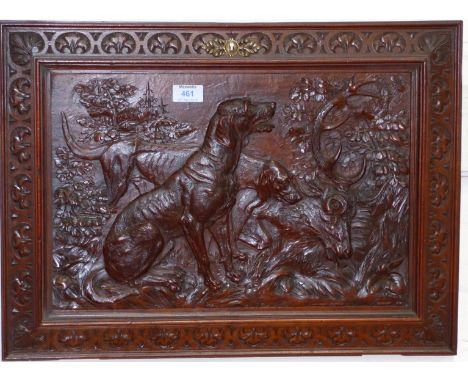 A 19th century wood panel depicting a hunting scene with stags and dogs, 23 " x 17"
