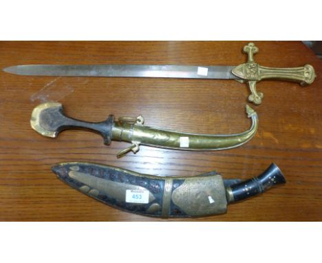 A VR bandsman's sword with solid brass hilt; a Middle Eastern dagger with engraved scabbard; and a kukrhi