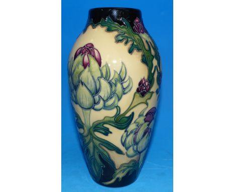 A modern Moorcroft ovoid baluster vase decorated with acanthus style flower, cream ground, impressed print green, dated 2014 