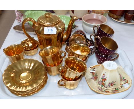 A set of 6 Carltonware Rouge Royale polka dot coffee cups and saucers with gilt interiors; a Wade gold lustre 15 piece coffee