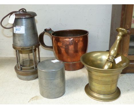 A miner's lamp by the Wolf Safety Lamp Co; a 19th century brass pestle and mortar; a 19th century copper measure; a pewter bo