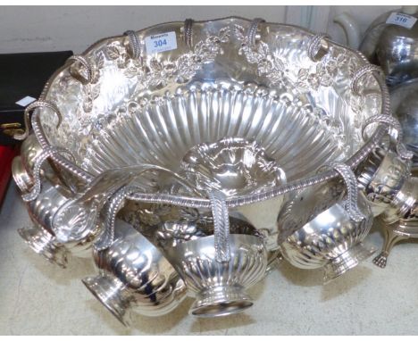 An EPNS punch bowl with 12 cups and ladle 