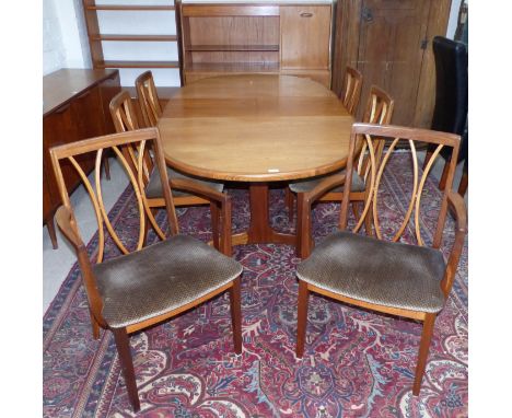 A G-Plan teak dining suite comprising oval table, 6 (4 + 2) chairs, and sideboard of 3 drawers and double cupboard, with disp