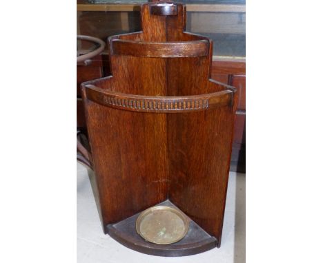 An oak corner stick stand