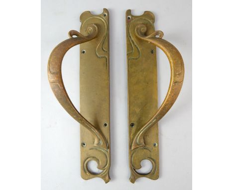 Pair of Art Nouveau brass door handles made by W&R Leggot London & Bradford. (said to come from the market hall in Reigate). 