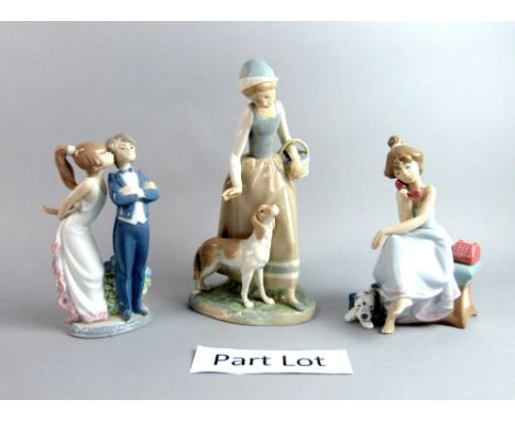 A quantity of Lladro and Nao figurines, unboxed, including Chit Chat, Eskimo boy and others (11 in lot).     Girl with dog: a