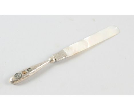 Unusual stone inlaid silver handled letter opener with Celtic decoration, makers mark: S and Co, Birmingham 1906.     