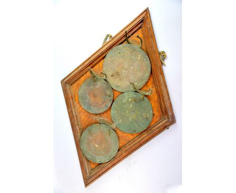 Wall hanging gong, ceiling light and display case.     