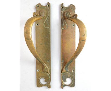 Pair of Art Nouveau brass door handles made by W&R Leggot London & Bradford. (said to come from the market hall in Reigate). 