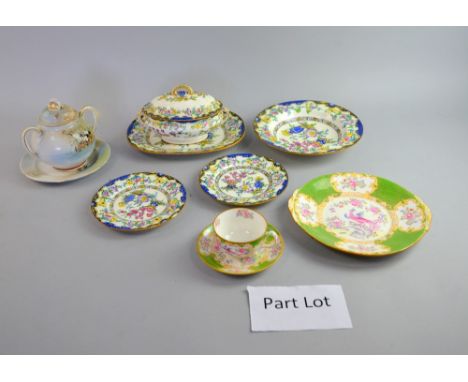 Minton's dinner service comprising 11 dessert bowls, 11 dessert plates, 11 side plates, 2 meat platters, 2 tureen stands, 9 d