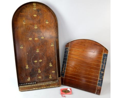 Bagatelle board and shove halfpenny board .     