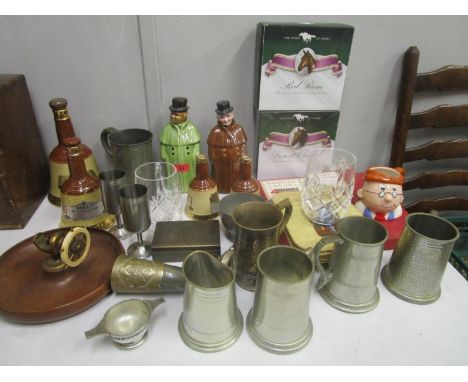 A mixed lot to include Wade Bells Scotch Whisky bottles, pottery monk decanters, Red Rum and Desert Orchid boxed model horses