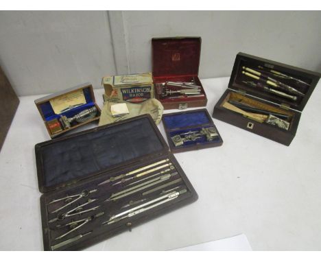 A boxed Wilkinson razor Empire model, a leather cased Wotanoes Gesch razor and three boxes of geometry implements 
