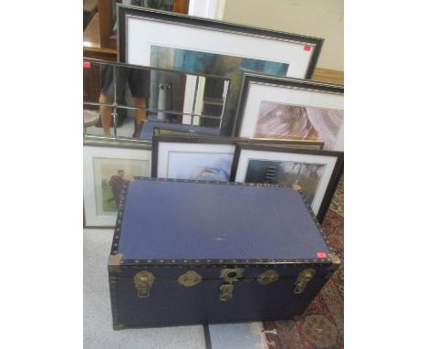 A large vintage canvas bound twin handled trunk, together with mixed mainly modern contemporary prints, and a modern wall mir